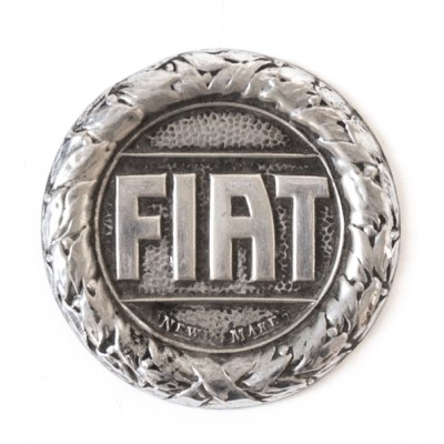 Emblemat samochodowy marki FIAT Lata 20. XX wieku.